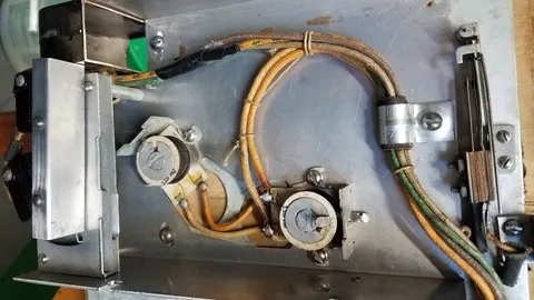 Coin Mechanism Removed from Housing*