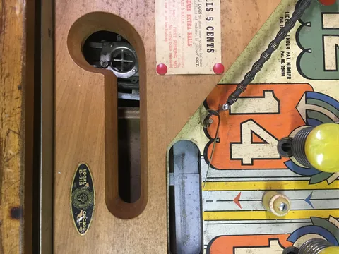Playfield - Dual-Action Trough Ball Release