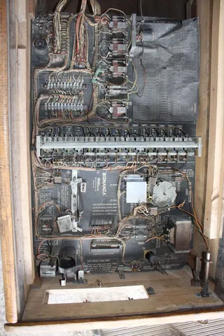 Inside Cabinet (with retrofit flipper button)*