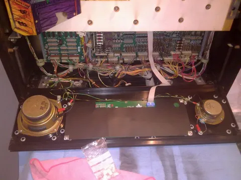 Behind Speaker Panel*