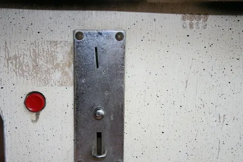 Coin Slot and Serial Number*