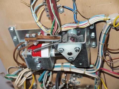 Under Playfield - Left Flipper Mechanism*
