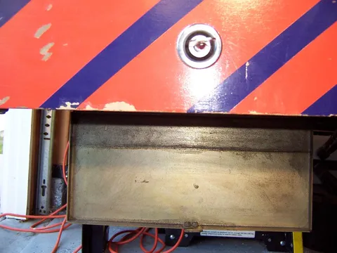 Coin Dump Access Door*