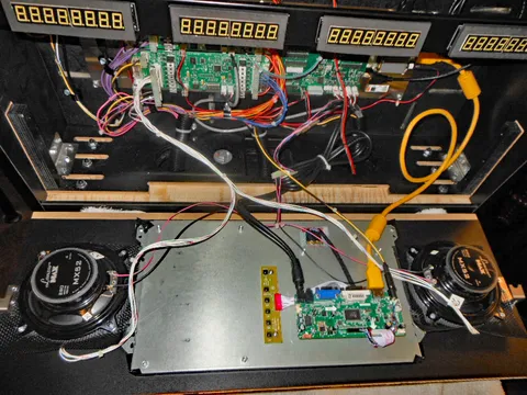 Behind Speakers and Display Panel