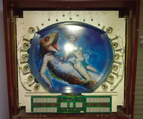 Behind Outer Backglass*